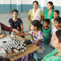 A medical team of the health department checks patients at Gandhi Camp in Jalandhar on Thursday. Tribune Photo: Sarabjit Singh, with Rachna Story